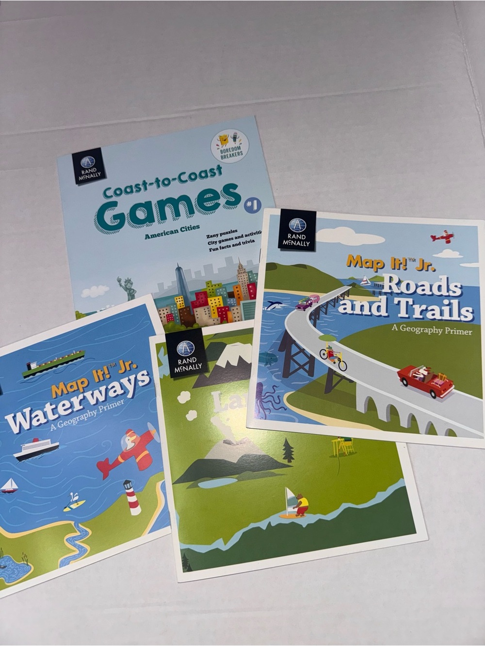 Map It! Jr. Geography, Roads and Trails, landforms- 4 books